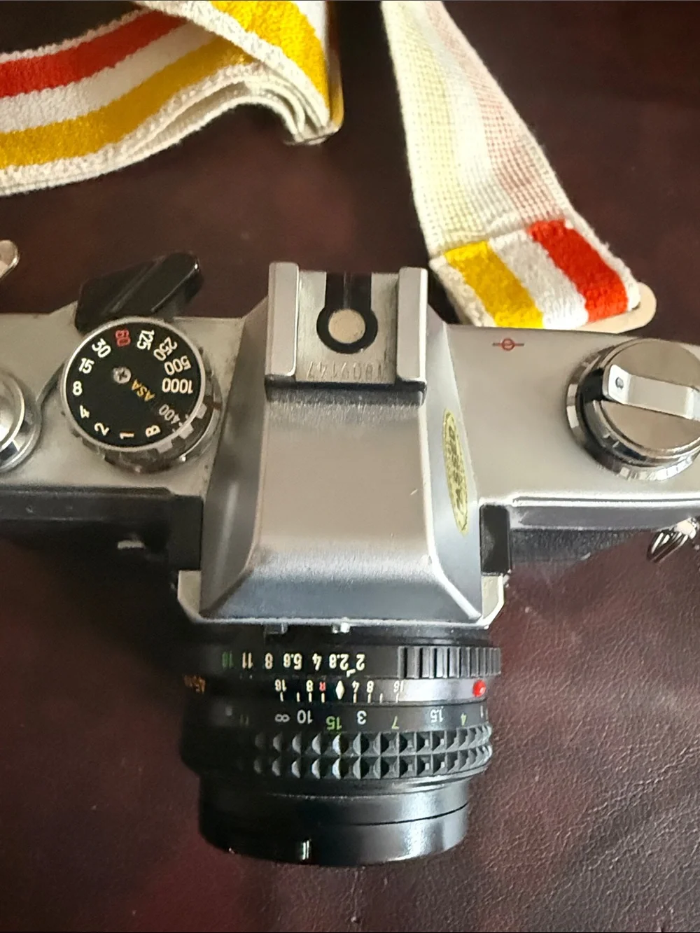 Minolta SR-T 201 35mm Film Camera in Silver and Black with Retro Stripe Strap